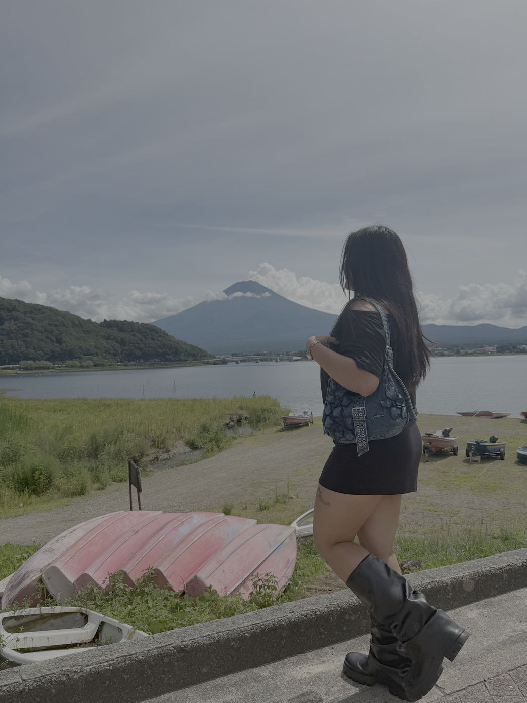 Carla looking out at Mount Fuji across a lake