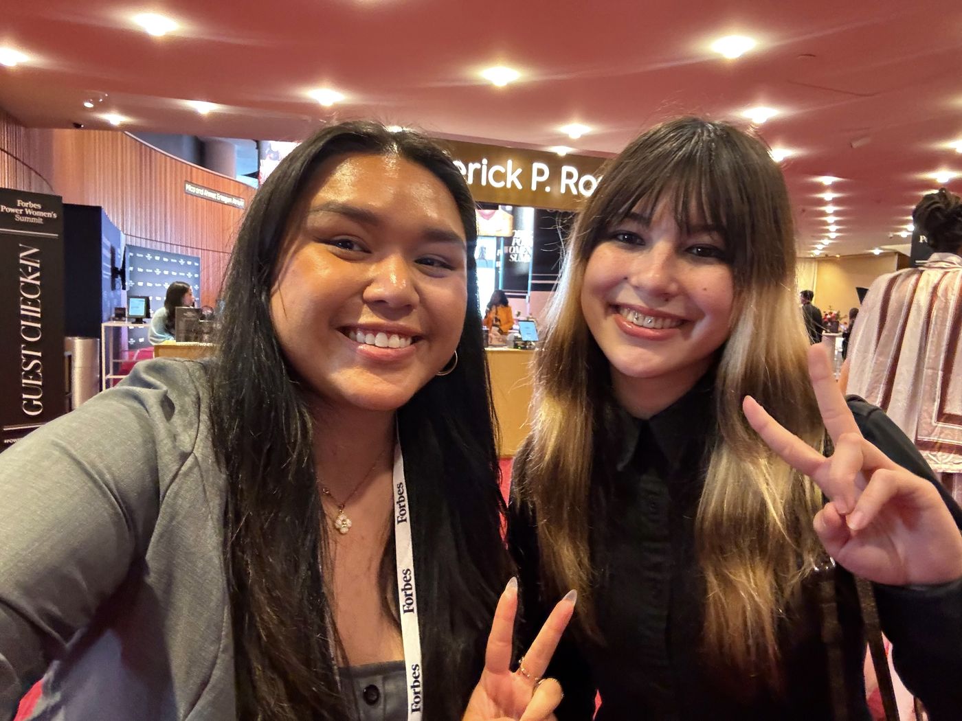 Carla and a friend at guest check-in for the Forbes Power Women's Summit